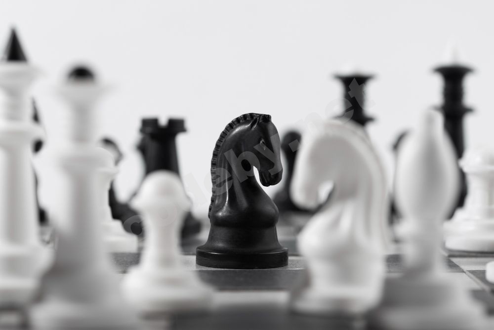 monochrome-chess-pieces-with-game-board.jpg